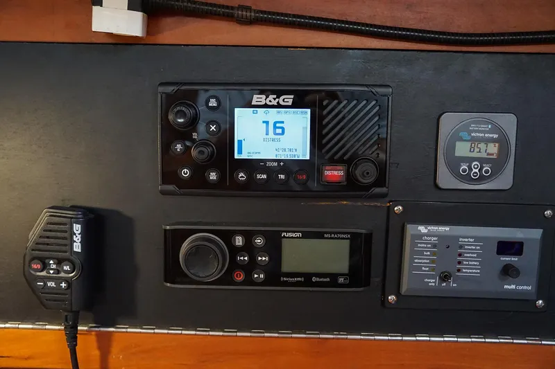 Slide: The Image of Control panel of a 2001 J Boats J/42 sailboat with navigation and communication equipment. - 30