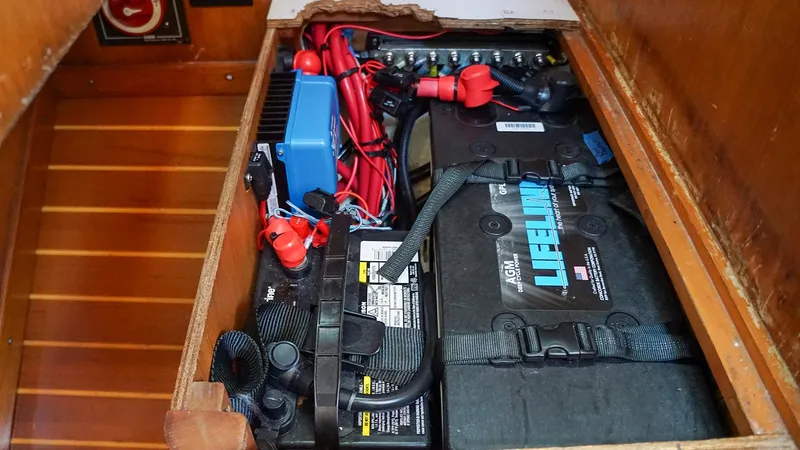 Slide: The Image of Battery compartment of 2001 J Boats J/42 sailboat with Lifeline AGM battery. - 33