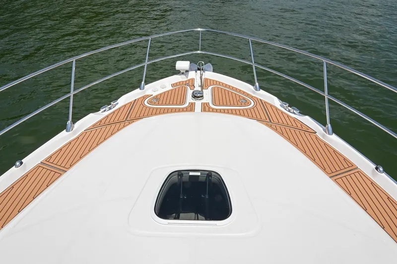 Slide: The Image of Bow view of 2007 Sea Ray 60 Sundancer yacht with teak decking. - 25