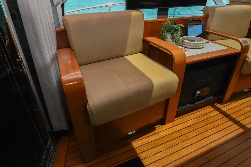 Slide: The Image of Luxurious seating area on 2007 Sea Ray 60 Sundancer yacht with wooden flooring. - 43