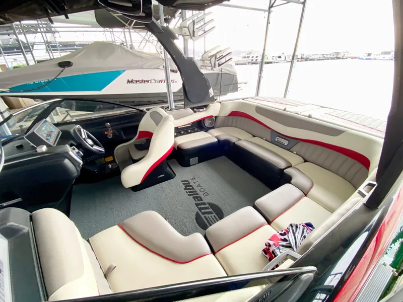 Slide: The Image of 2015 Malibu Wakesetter 22 MXZ interior with spacious seating and modern design. - 10