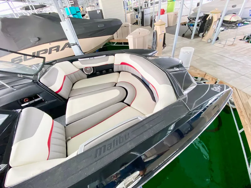 Slide: The Image of 2015 Malibu Wakesetter 22 MXZ boat interior with sleek seating design. - 14