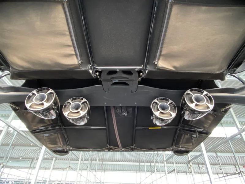 Slide: The Image of Underside view of 2015 Malibu Wakesetter 22 MXZ boat with four exhaust ports. - 19