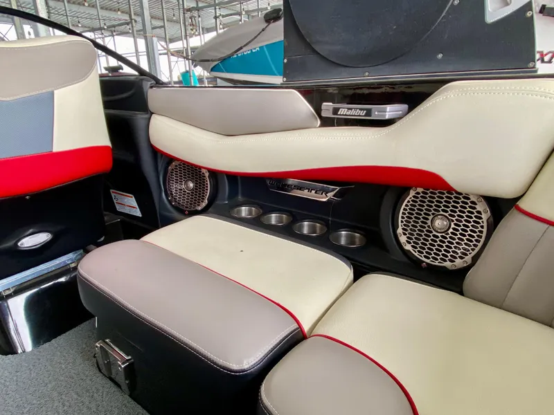 Slide: The Image of Interior of 2015 Malibu Wakesetter 22 MXZ with stylish seating and audio system. - 20