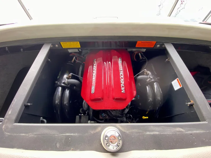 Slide: The Image of 2015 Malibu Wakesetter 22 MXZ engine compartment with Monsoon 350 engine. - 24