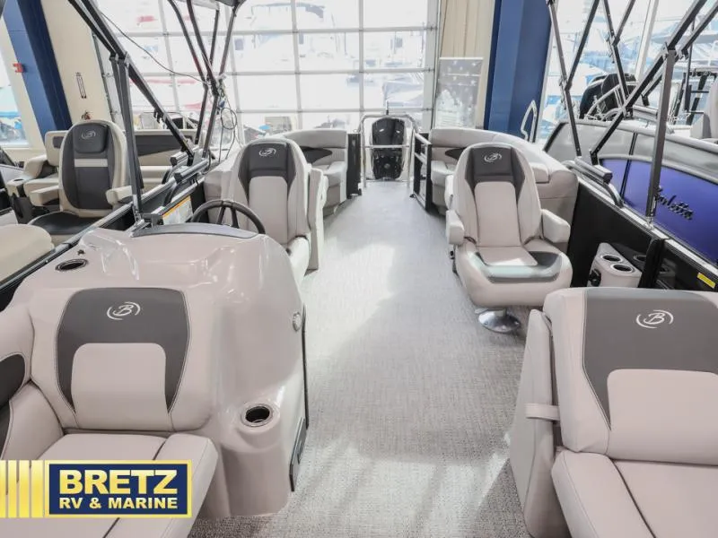 Slide: The Image of Interior of 2025 Aria 22QC pontoon boat at Bretz RV & Marine showroom. - 8