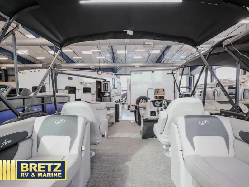 Slide: The Image of Interior view of 2025 Aria 22QC boat at Bretz RV & Marine showroom. - 9