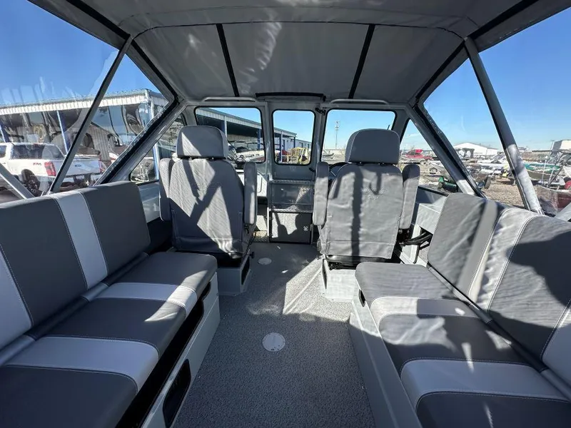 Slide: The Image of Interior of 2025 Hewescraft 210 Sea Runner ET boat with spacious seating. - 5