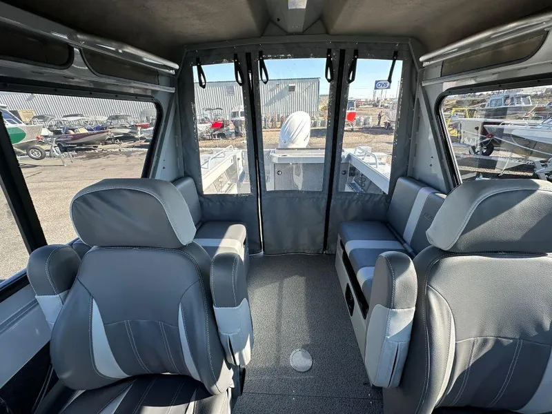 Slide: The Image of Interior of 2025 Hewescraft 210 Sea Runner ET HT, featuring spacious seating and modern design. - 7