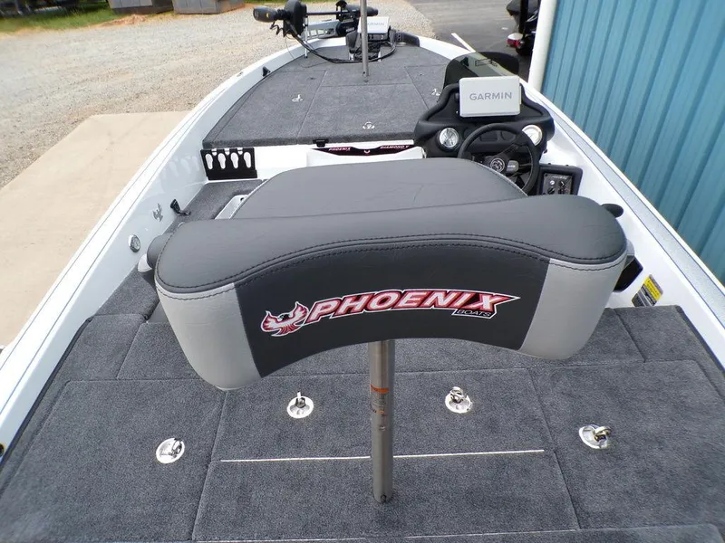 Slide: The Image of 2025 Phoenix 818 Pro boat interior with Garmin system and branded seat. - 12