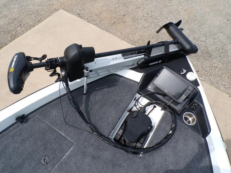 Slide: The Image of 2025 Phoenix 818 Pro boat deck with trolling motor and navigation system. - 18