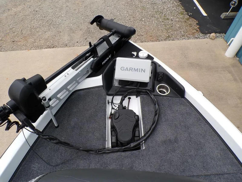 Slide: The Image of 2025 Phoenix 818 Pro boat deck with Garmin navigation system and trolling motor. - 19