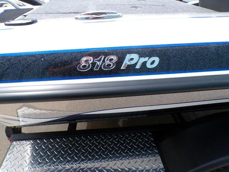 Slide: The Image of 2025 Phoenix 818 Pro boat with sleek design and metallic detailing. - 26