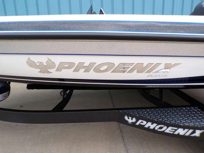 Slide: The Image of 2025 Phoenix 818 Pro boat with logo, displayed on a trailer. - 27