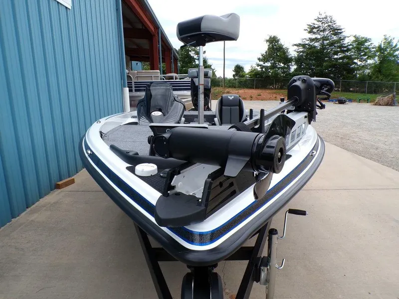 Slide: The Image of 2025 Phoenix 818 Pro fishing boat, parked outdoors, showcasing sleek design and advanced features. - 28