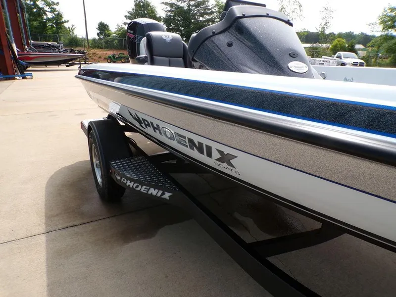Slide: The Image of 2025 Phoenix 818 Pro boat on trailer, side view, outdoors. - 29