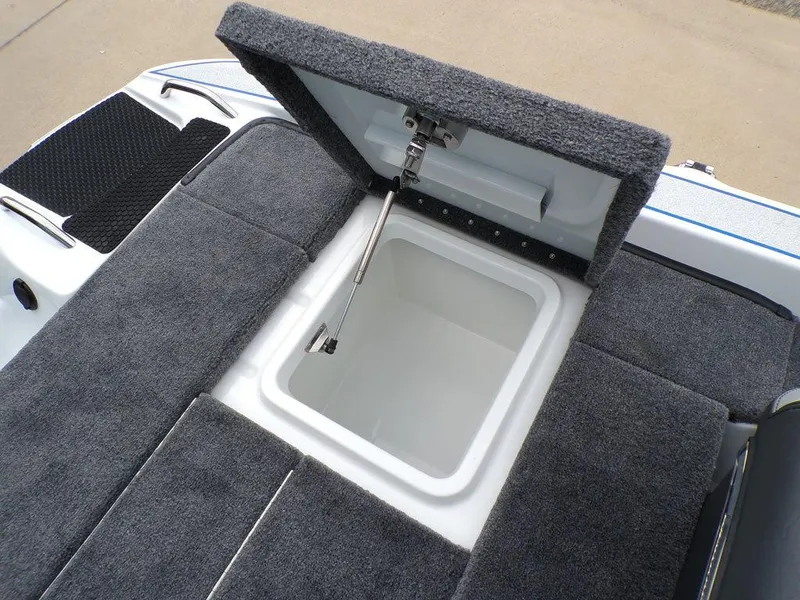 Slide: The Image of 2025 Phoenix 818 Pro boat storage compartment with open lid, showcasing interior space. - 31