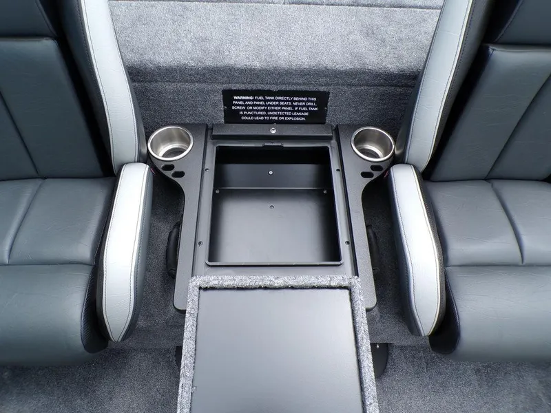 Slide: The Image of 2025 Phoenix 818 Pro interior with cup holders and storage compartment. - 5