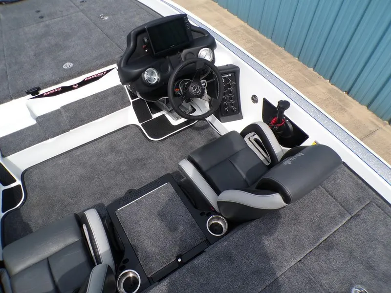 Slide: The Image of Interior of 2025 Phoenix 818 Pro boat with modern dashboard and seating. - 9