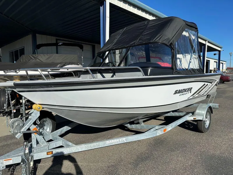 The Image of 2025 Smoker Craft Osprey 172 boat on trailer, parked outdoors. - 0