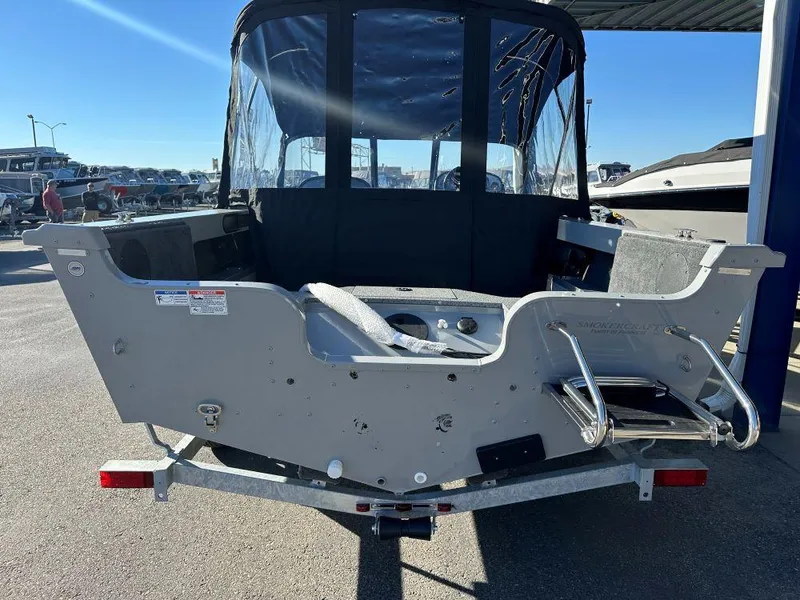 Slide: The Image of 2025 Smoker Craft Osprey 172 boat rear view with ladder and canopy. - 3