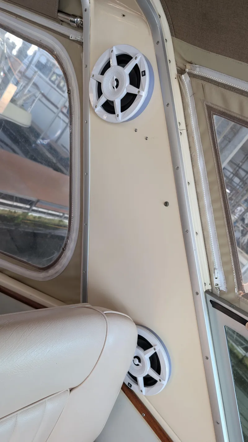 Slide: The Image of Interior of 1987 Sea Ray 390 Express Cruiser with installed speakers. - 43