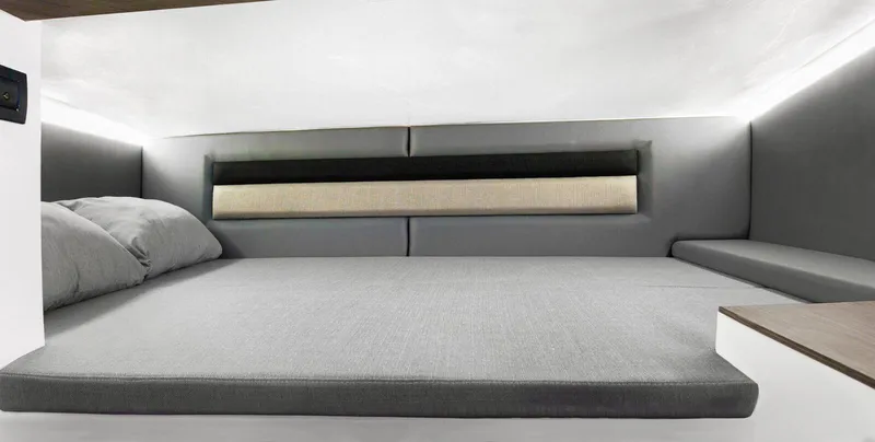 Slide: The Image of Interior cabin of 2025 Ranieri NEXT 275 LX, featuring a modern, comfortable sleeping area. - 15