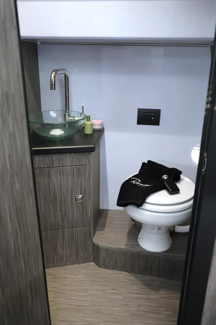 Slide: The Image of 2025 Ranieri NEXT 275 LX bathroom with modern sink and toilet. - 16
