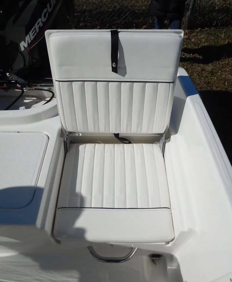 Slide: The Image of 2025 Bayliner Trophy T18Bay boat seat with white upholstery. - 28