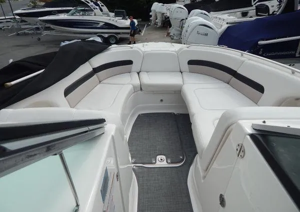 Slide: The Image of 2015 Chaparral 284 Sunesta boat interior with spacious seating and modern design. - 18