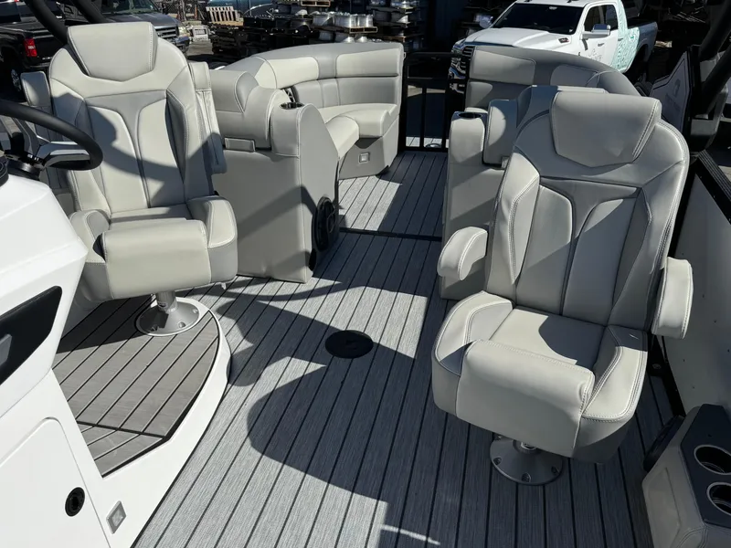 Slide: The Image of 2025 Montara 25' SURF BOSS 2.0 CWDH boat interior with luxurious seating. - 14
