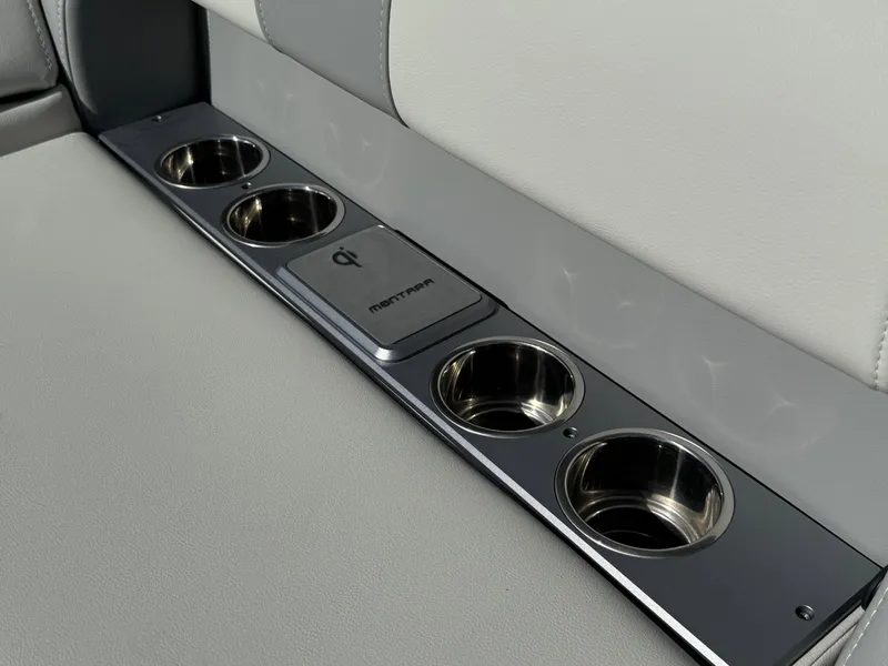 Slide: The Image of Montara 25' SURF BOSS 2.0 CWDH 2025 interior cup holders and wireless charging pad. - 17
