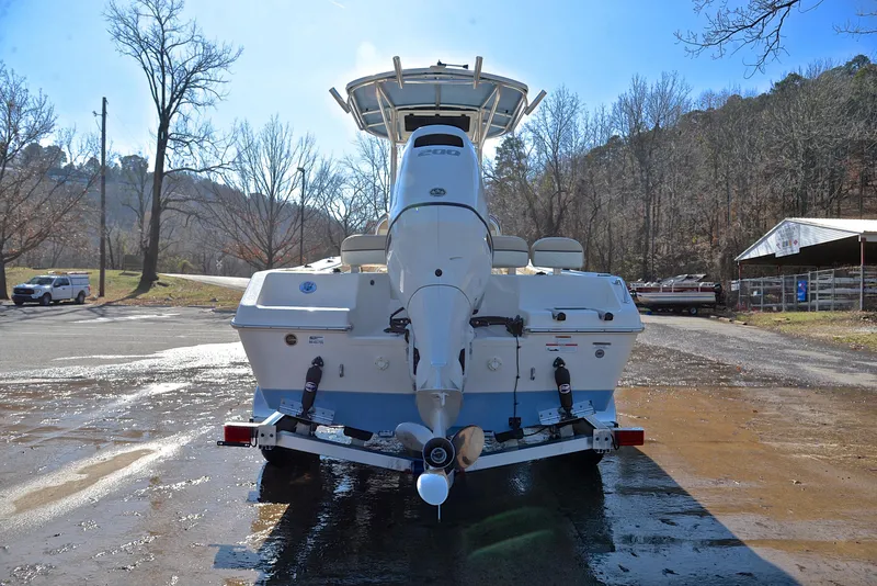 Slide: The Image of 2022 Sea Chaser 22 HFC boat on trailer, rear view, outdoors. - 13