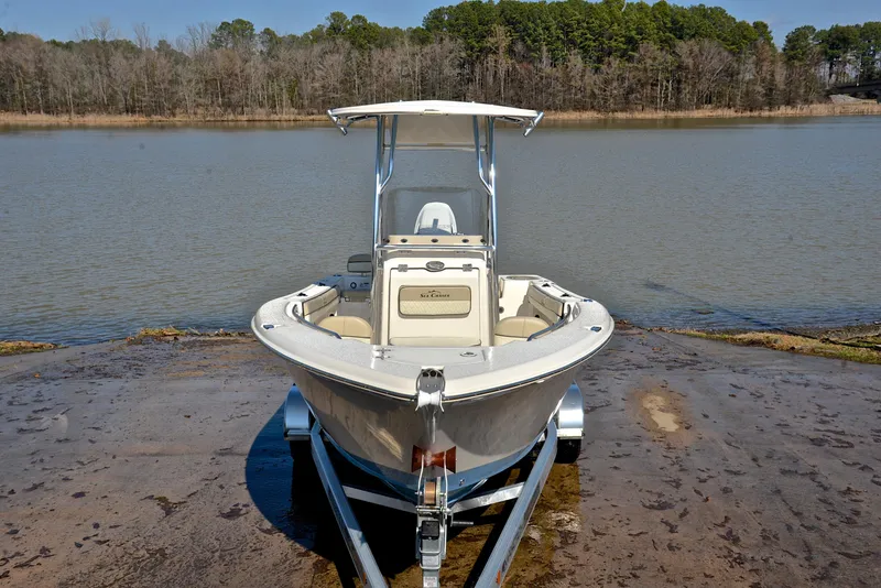 Slide: The Image of 2022 Sea Chaser 22 HFC boat on trailer by a lake. - 17