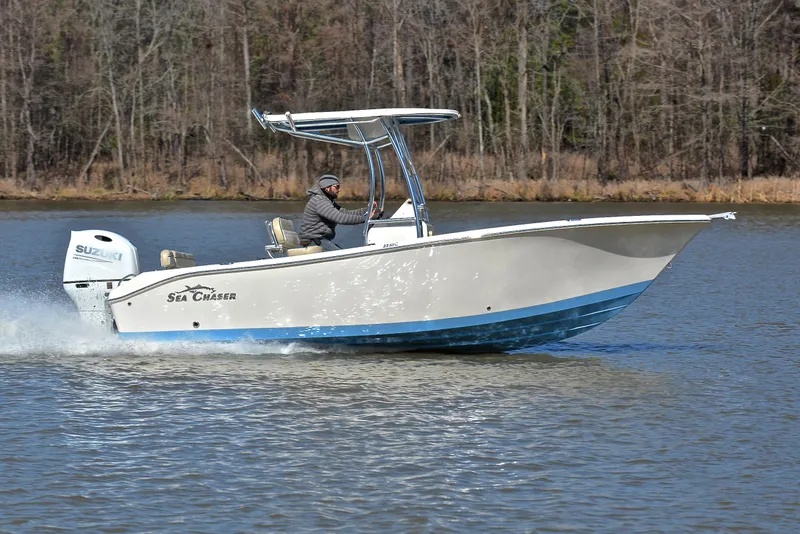 Slide: The Image of 2022 Sea Chaser 22 HFC boat cruising on a calm lake. - 3