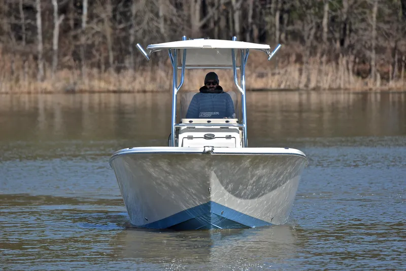 Slide: The Image of 2022 Sea Chaser 22 HFC boat on calm water, front view. - 9
