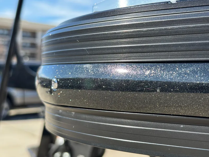 Slide: The Image of Close-up of 2025 Montara 25' SURF BOSS 2.0 SL boat detail, showcasing metallic finish. - 11