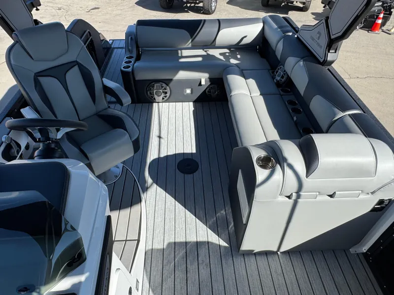 Slide: The Image of 2025 Montara 25' SURF BOSS 2.0 SL interior with gray seating and modern design. - 15