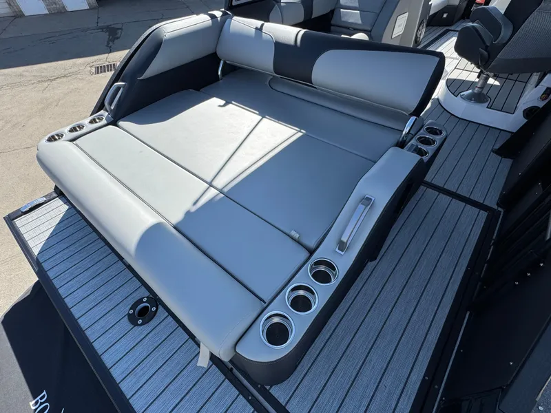 Slide: The Image of Luxurious seating on 2025 Montara 25' SURF BOSS 2.0 SL boat with cup holders. - 21