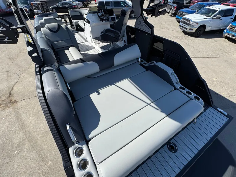 Slide: The Image of 2025 Montara 25' SURF BOSS 2.0 SL boat with spacious seating and modern design. - 22