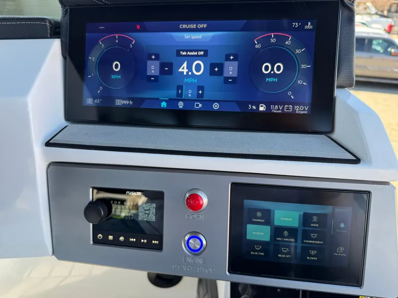 Slide: The Image of Dashboard of 2025 Montara 25' SURF BOSS 2.0 SL with digital displays and controls. - 27