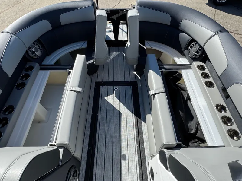 Slide: The Image of 2025 Montara 25' SURF BOSS 2.0 SL interior with sleek seating and modern design. - 30