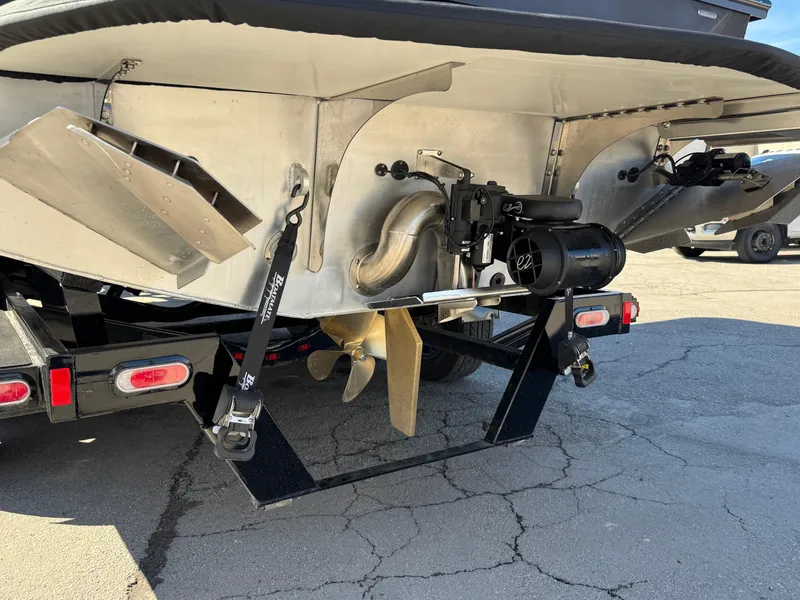 Slide: The Image of Rear view of 2025 Montara 25' SURF BOSS 2.0 SL boat on trailer. - 6