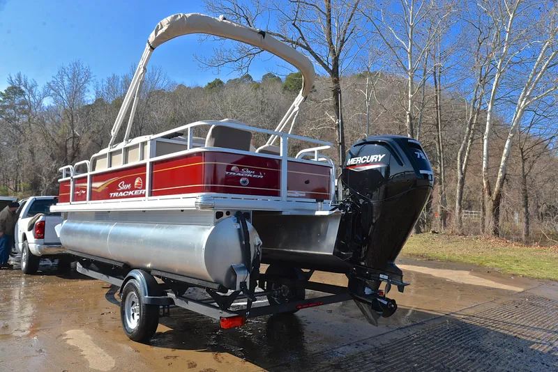 Slide: The Image of 2024 Sun Tracker BASS BUGGY 18 pontoon boat with Mercury engine on trailer. - 12