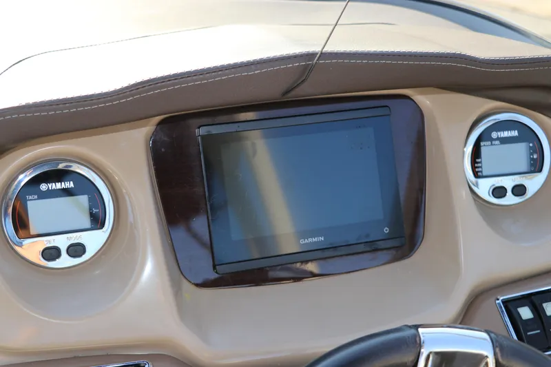 Slide: The Image of Dashboard of 2018 Chaparral 230 Suncoast boat with Yamaha gauges and Garmin display. - 18