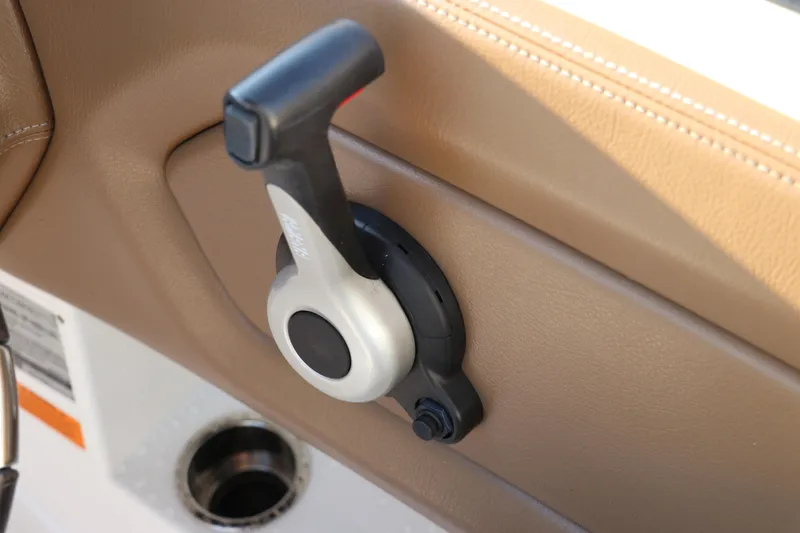 Slide: The Image of Throttle control lever on 2018 Chaparral 230 Suncoast boat, beige interior. - 27