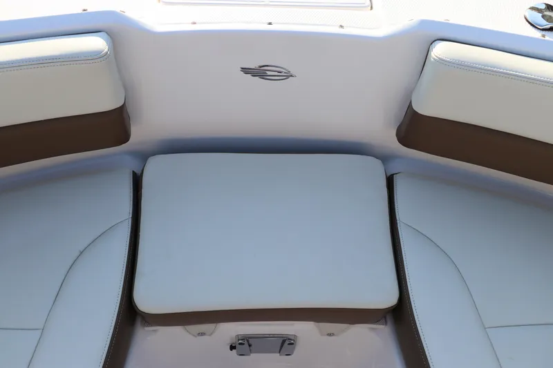Slide: The Image of 2018 Chaparral 230 Suncoast boat interior seating with cushioned upholstery. - 35