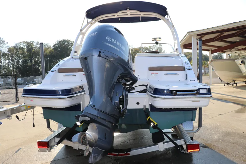 Slide: The Image of 2018 Chaparral 230 Suncoast boat with Yamaha outboard motor on trailer. - 5