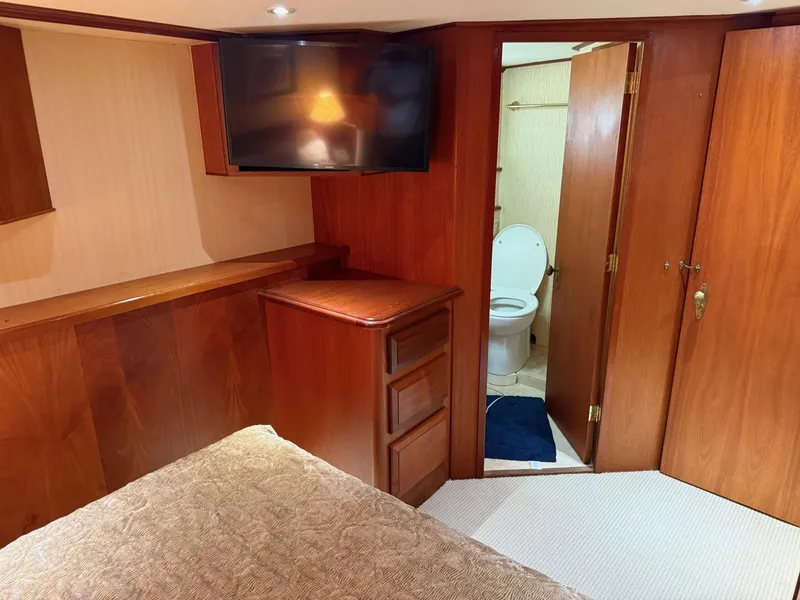Slide: The Image of Bedroom interior of 1972 Burger 81 Raised Pilothouse yacht with ensuite bathroom. - 18
