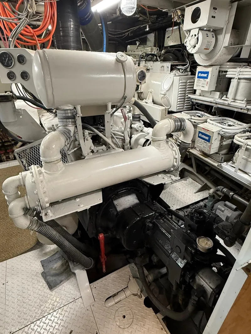 Slide: The Image of Engine room of a 1972 Burger 81 Raised Pilothouse yacht, showcasing mechanical components. - 22